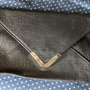 Black envelope clutch